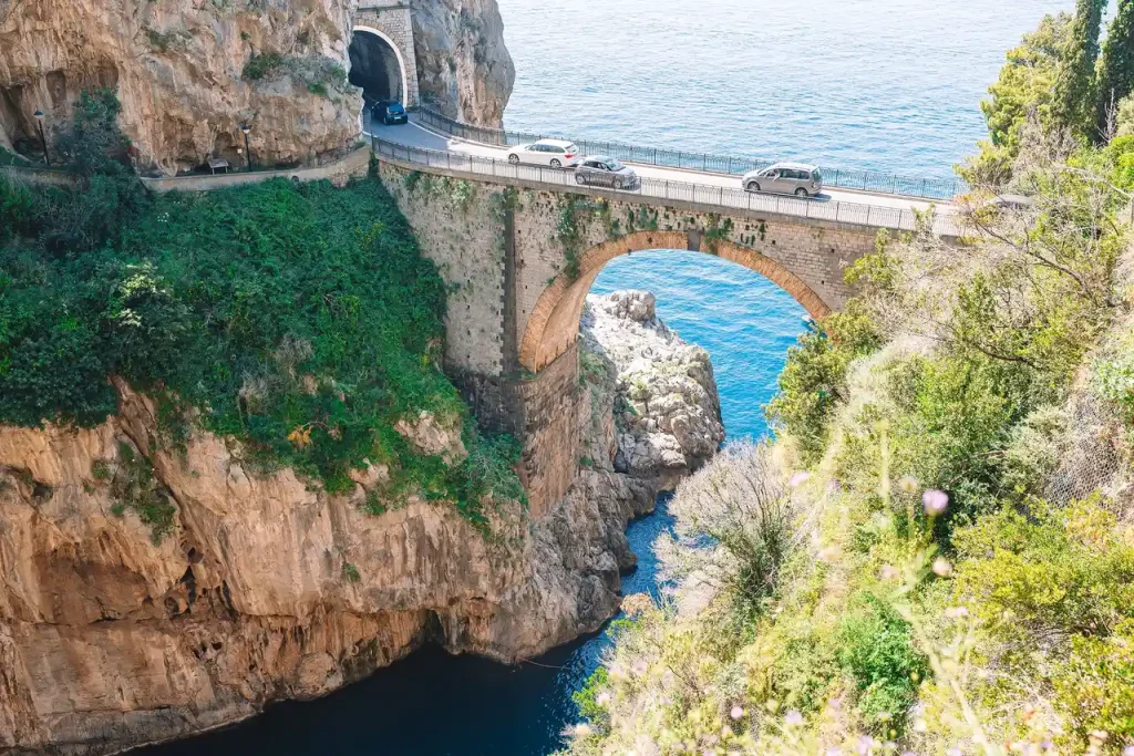Famous fiordo di furore beach seen from bridge. View from Furore Amalfi coast with Car tours of Amalfi Coast lovers Agency